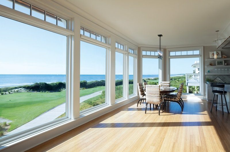 oversized-windows-overlooking-a-gold-course